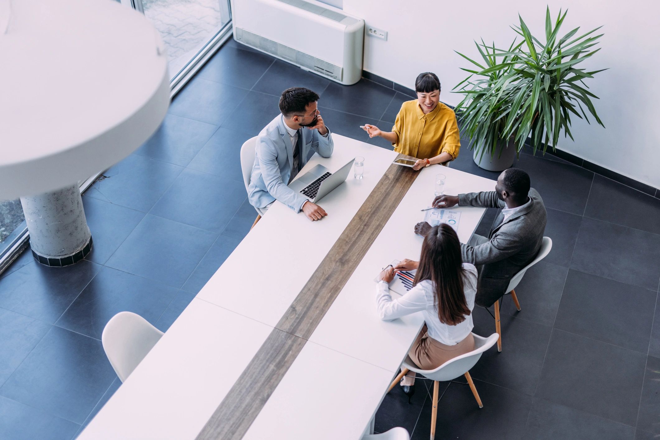 Business team reviewing plans in a meeting